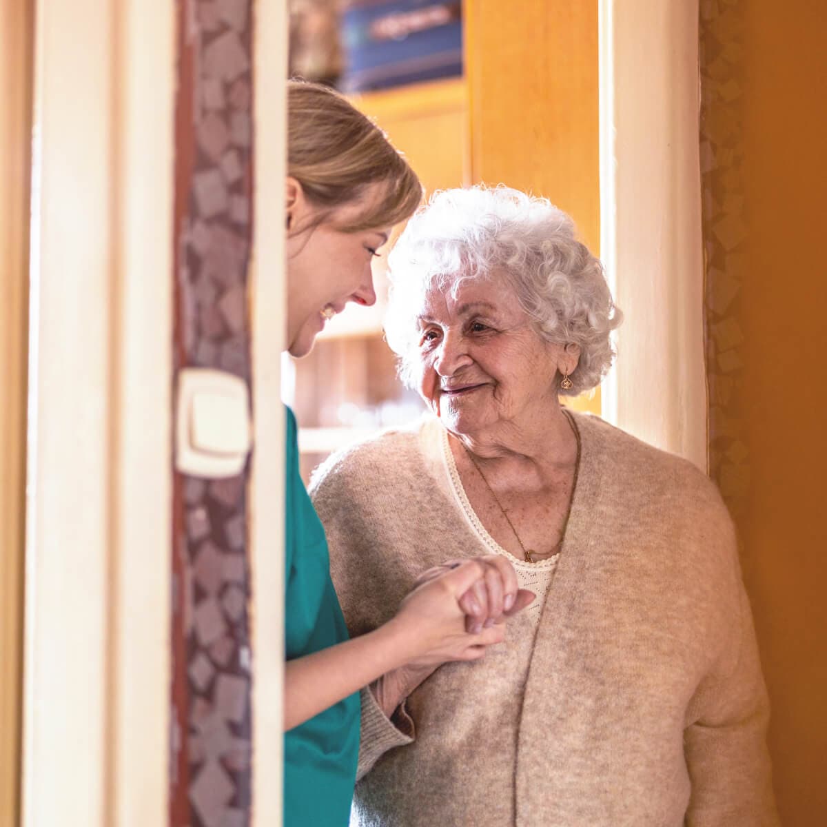 Caregiver and elderly woman