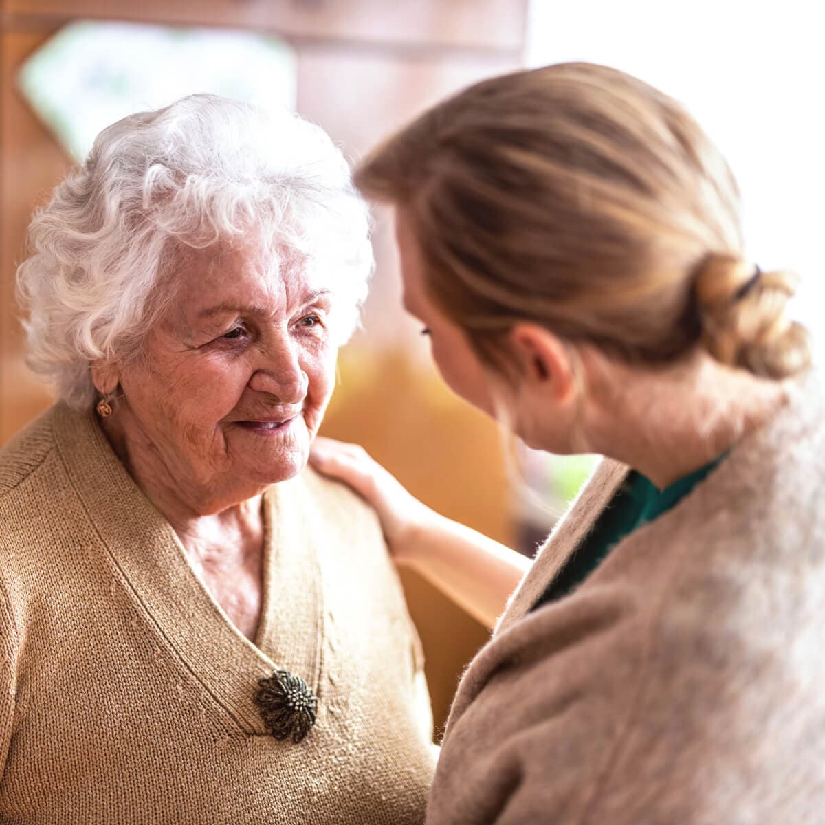 Two elderly woman communicating